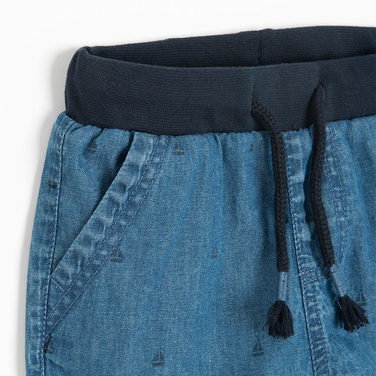 Denim shorts with small boats pattern