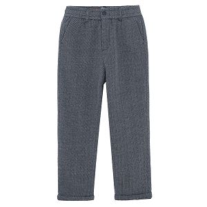 Grey trousers with pleats