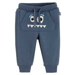 מכנס טרנינג בצבע אפור כחול עם הדפס פנים מצחיקות