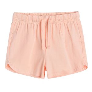 מכנסיים קצרים בצבע אפרסק עם מותן אלסטי ופפיון