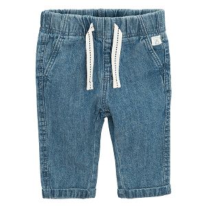 Denim pants with cord on the waist